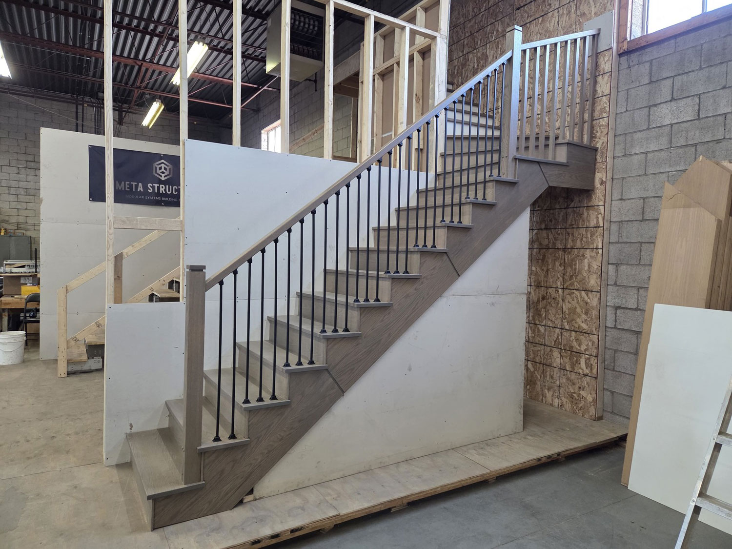 Modular staircase installed within a building under construction